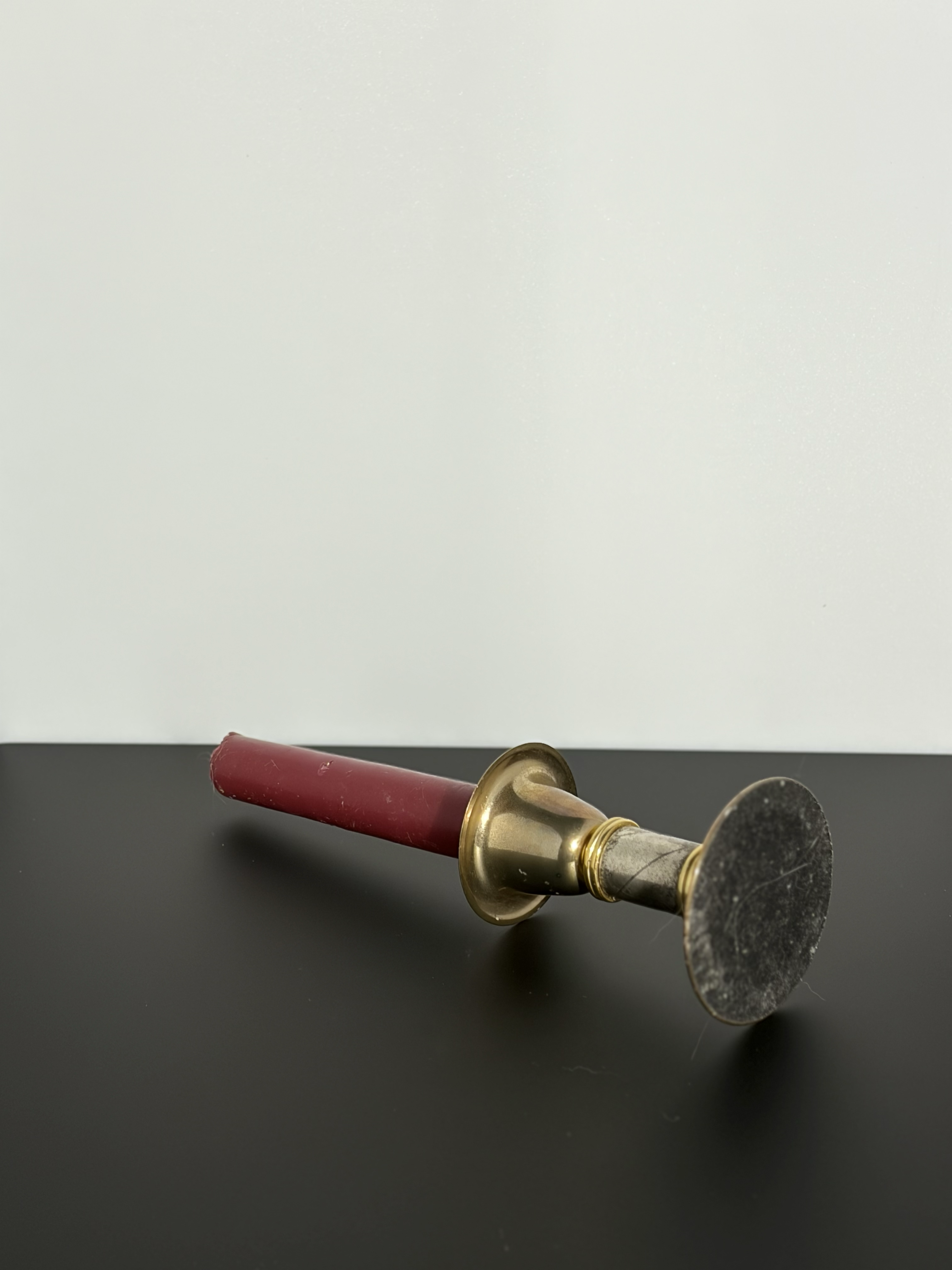 3:4 view of a candle.